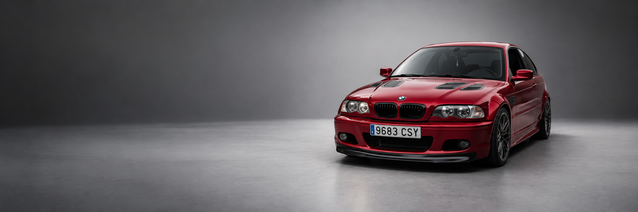 BMW Serie 3 E46 rojo preparado con kit aerodinámico